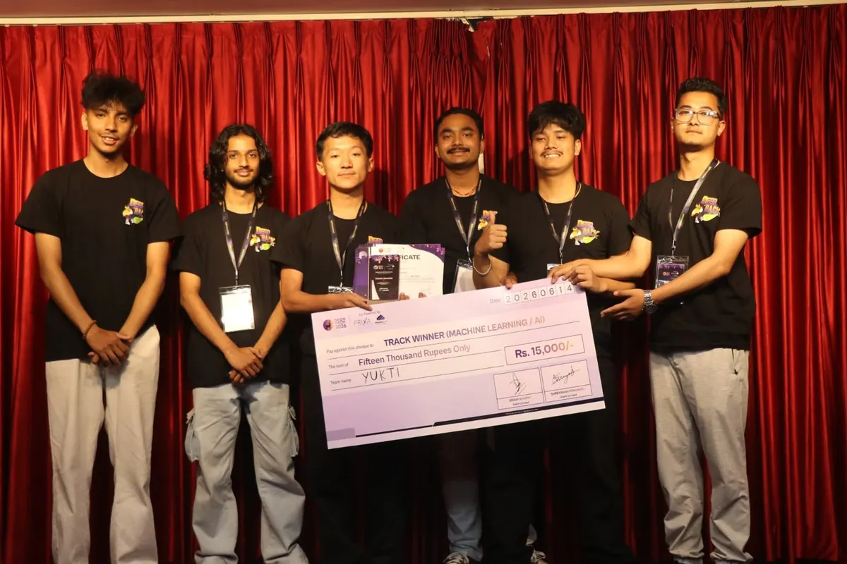 Team Yukti on stage holding the DeerHack 2026 AI/ML track winner cheque